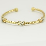 Gold Coloured Twist Wire with Cross Crystals Cuff